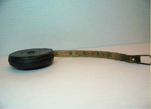 https://www.grandpasbarn.net/wp-content/uploads/2016/03/Antique-Lufkin-Rule-Tape-Measure_Img5.jpg